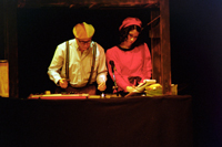 A man and a woman in a sound effects booth