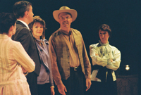 A woman in a white dress, a man in a suit, a woman in a lavender outfit, a man in a vest and cowboy hat,
       and a woman in a light green blouse